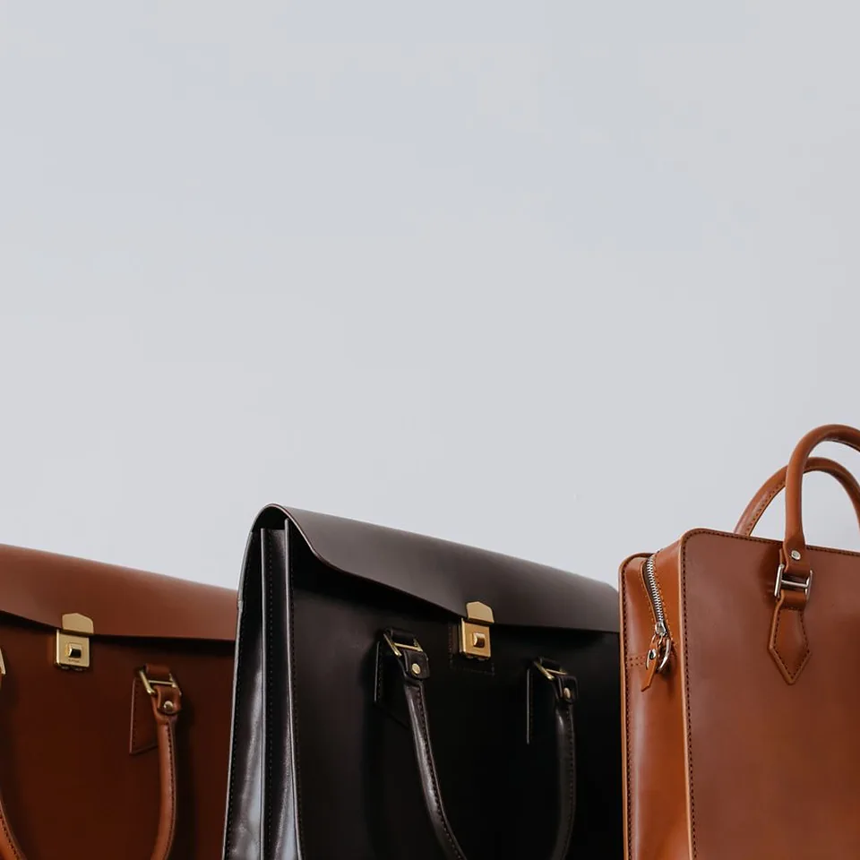 Three finished leather bags ready to leave the studio