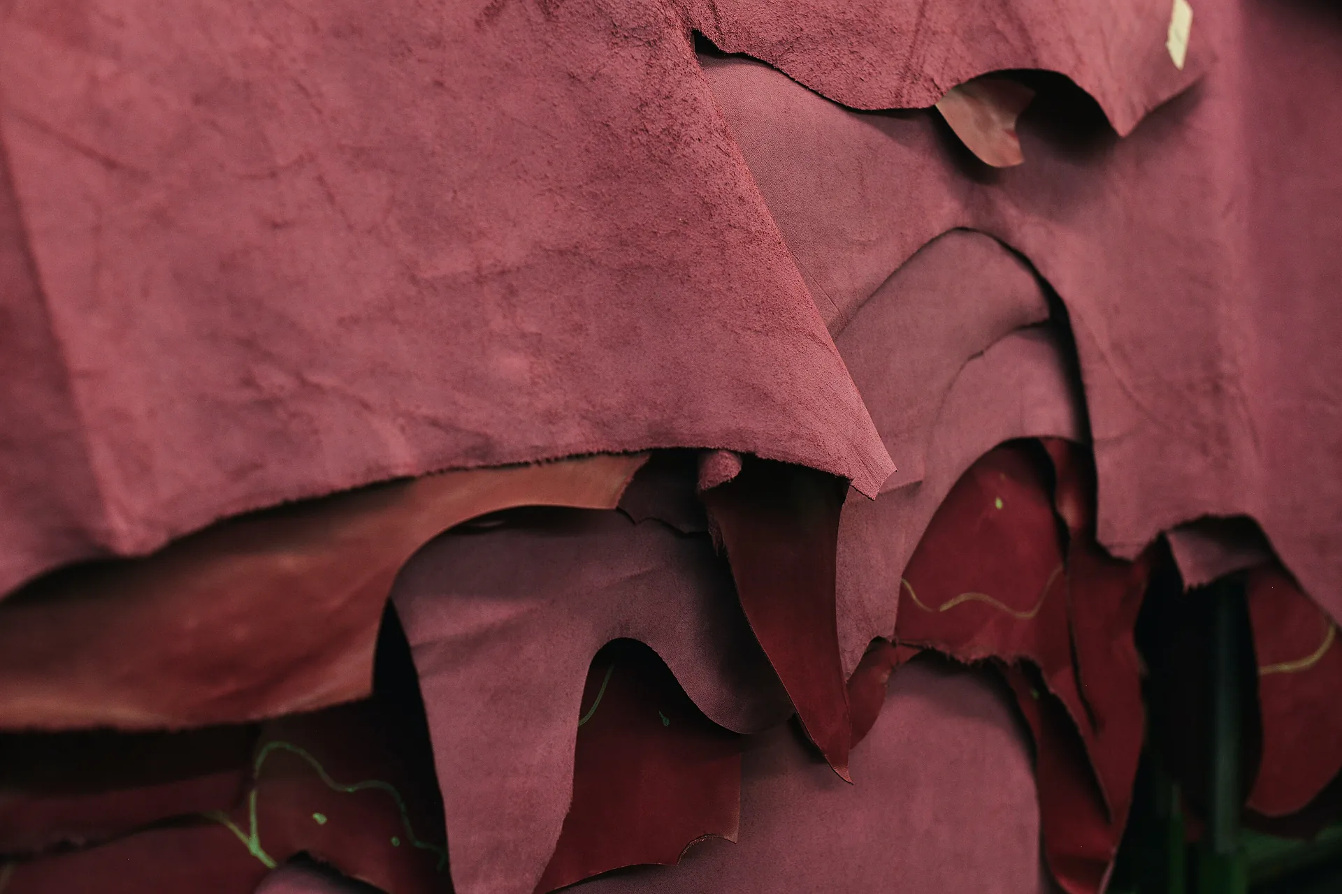 A stack of vegetable-tanned hides in the workroom