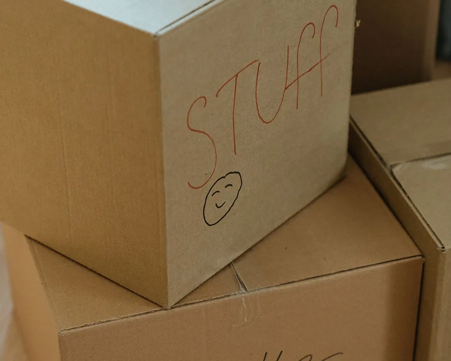 Packed cartons labelled and stacked for international dispatch