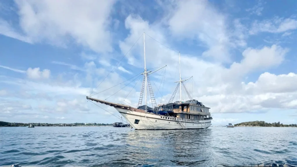 Luxury liveaboard phinisi at anchor off Komodo