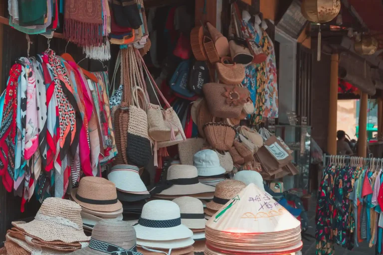 Handmade bags and hats on display at Ubud art market